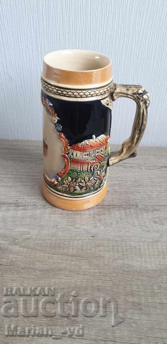Old porcelain beer mug