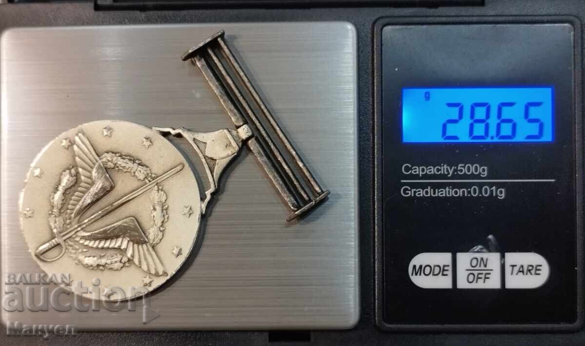 Доставка на Либия, орден " За военна заслга" IIстепен, сребро.