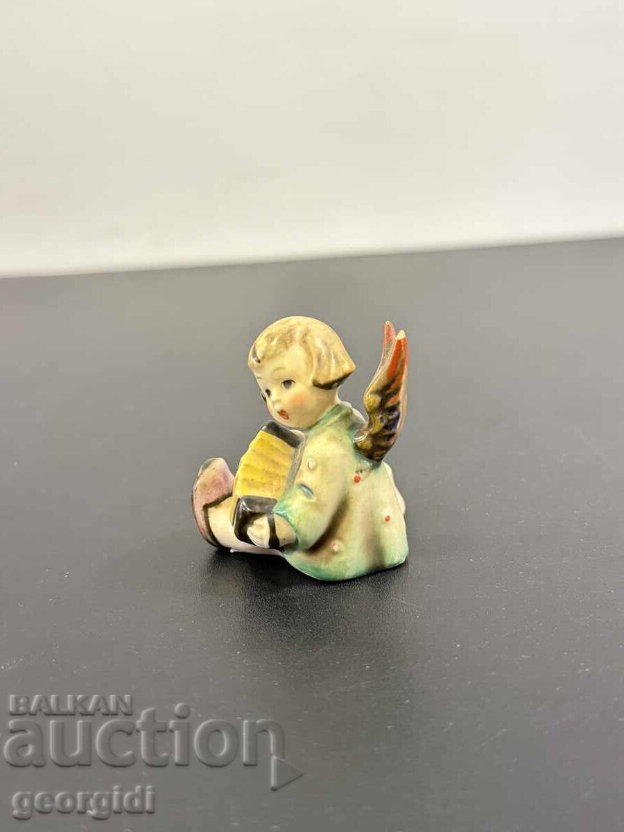 Licitație Statuetă din porțelan / sfeșnic Goebel-Hummel. Nr. 8091