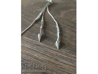 обеца на ухото