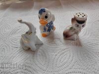 Old porcelain figurines, salt shaker, little elephant and duckling