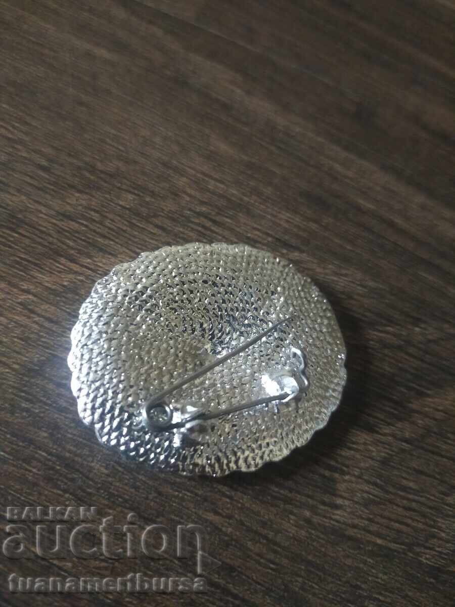 Licitație broşă