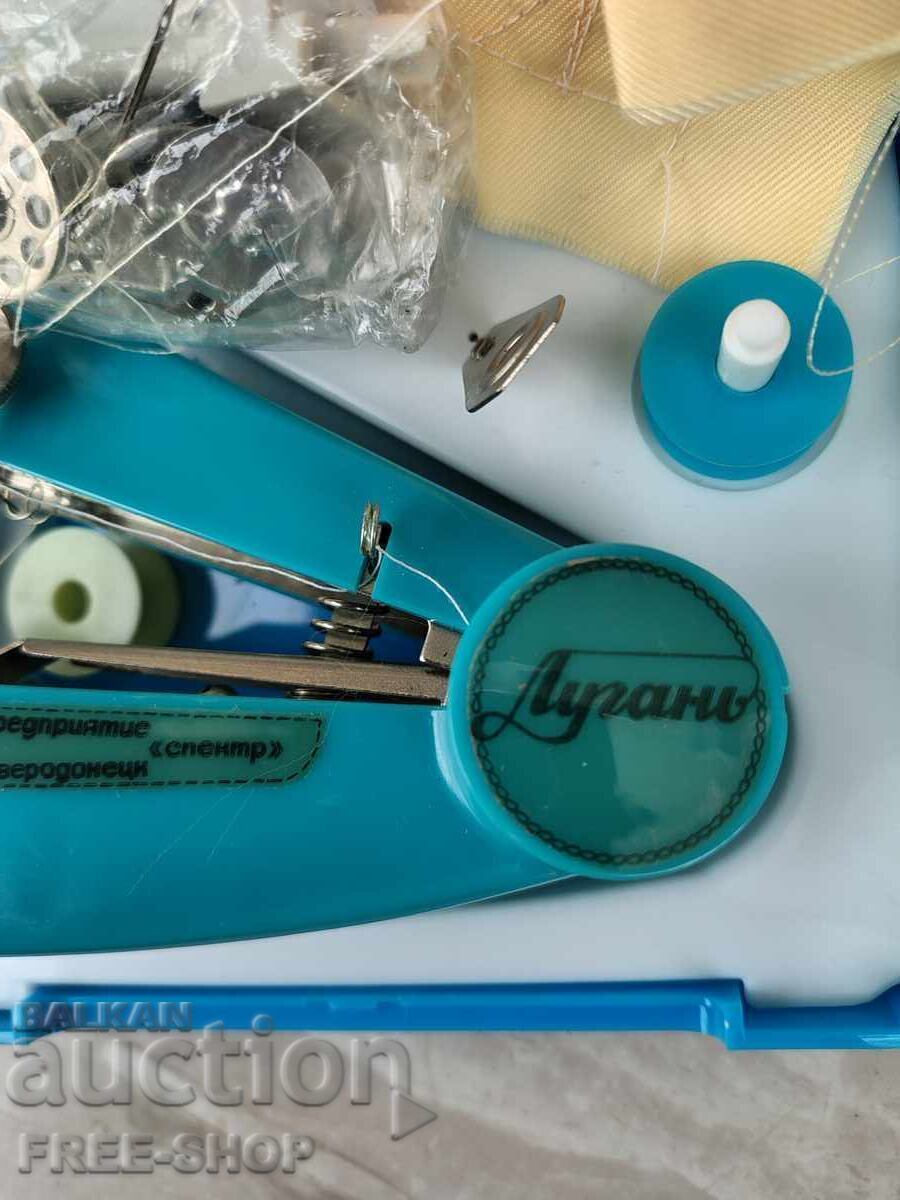 Livrarea Mașină de cusut portabilă - neutilizată Livrarea Mașină de cusut portabilă - neutilizată