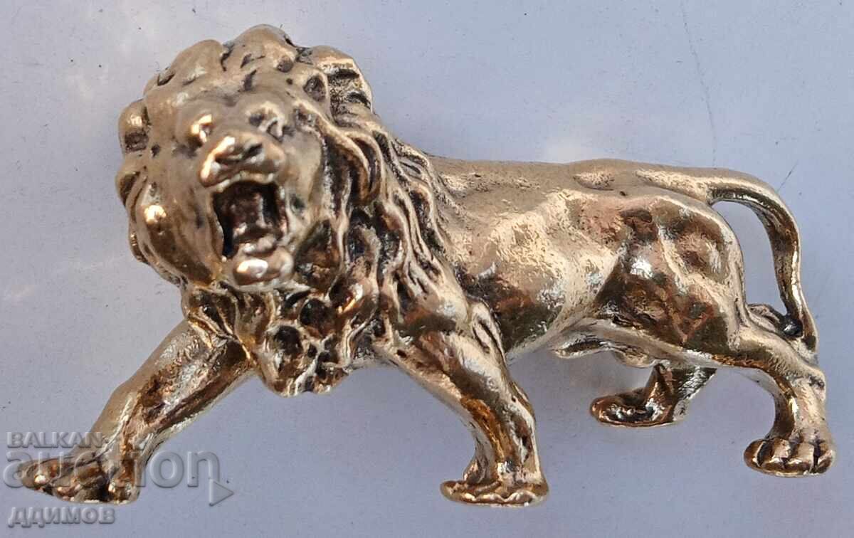 Bronze lion cub