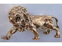 Bronze lion cub