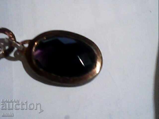 Delivery of Old silver pendant with a large amethyst stone