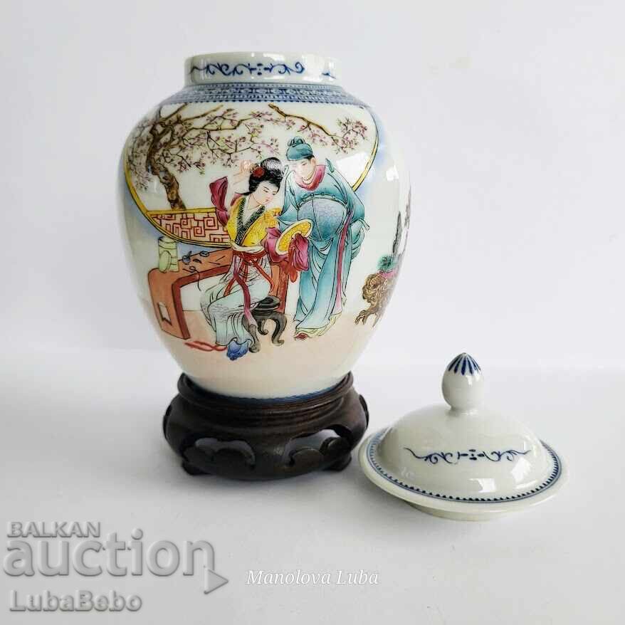 Auction  Chinese ginger jar on a wooden stand