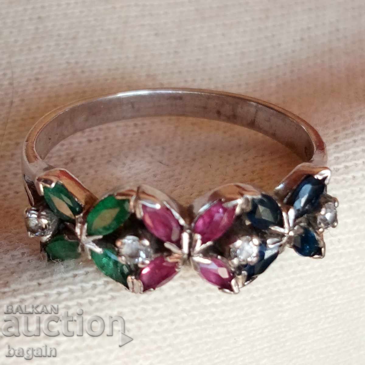 Ring with emeralds, rubies, and sapphires. Silver