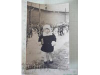 Παλιά φωτογραφία παιδιού τον χειμώνα