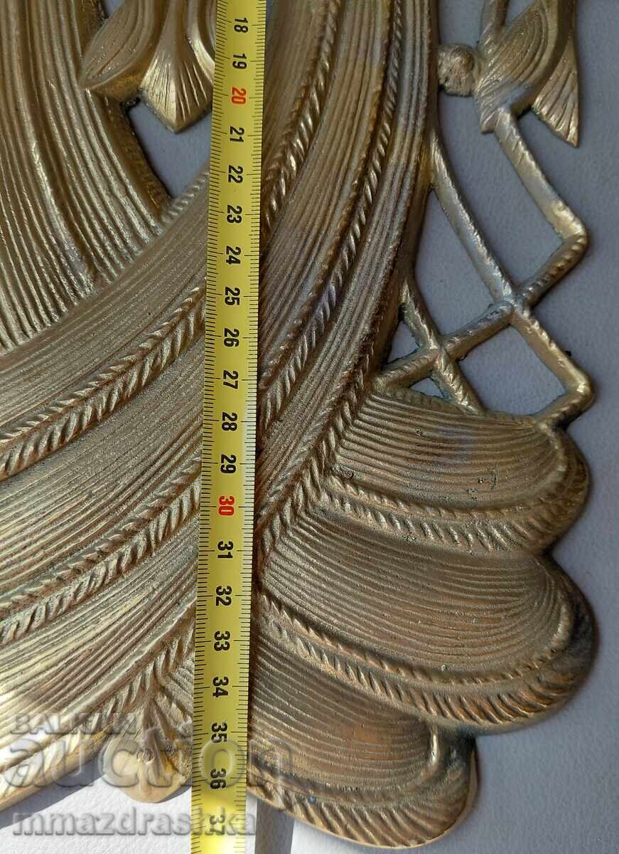 Delivery of Heavy bronze panel