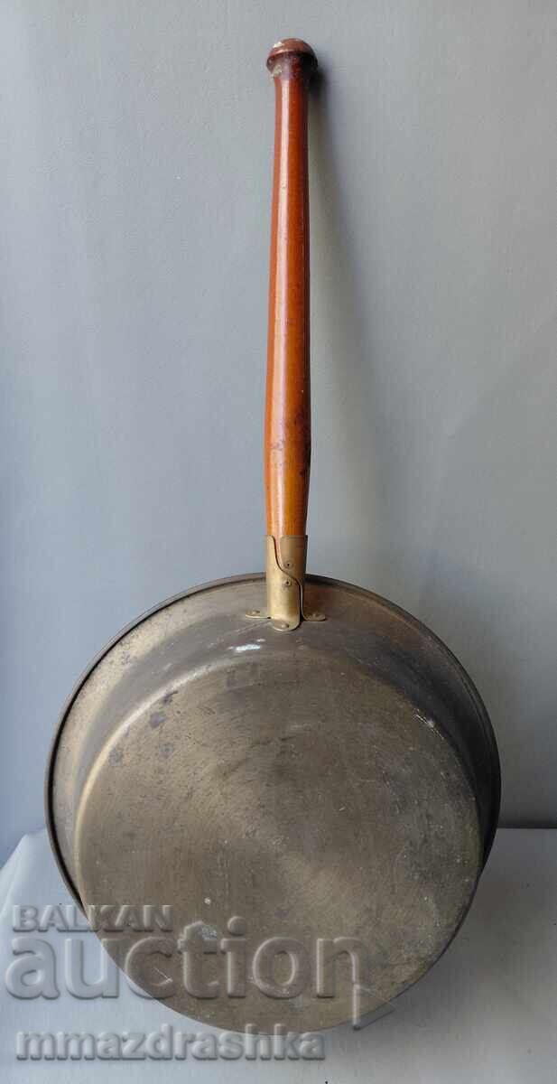 Delivery of Large and very old bronze pan