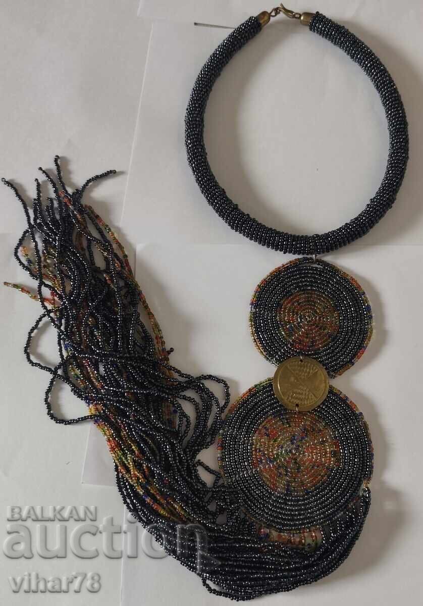 Delivery of beaded pendant necklace
