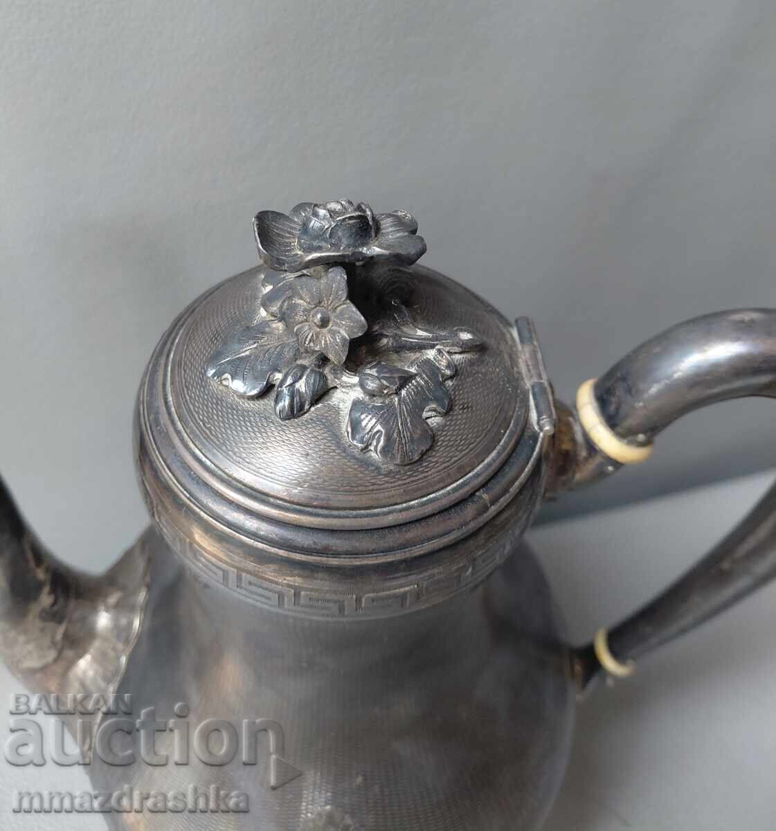 Auction  Victorian silver-plated teapot