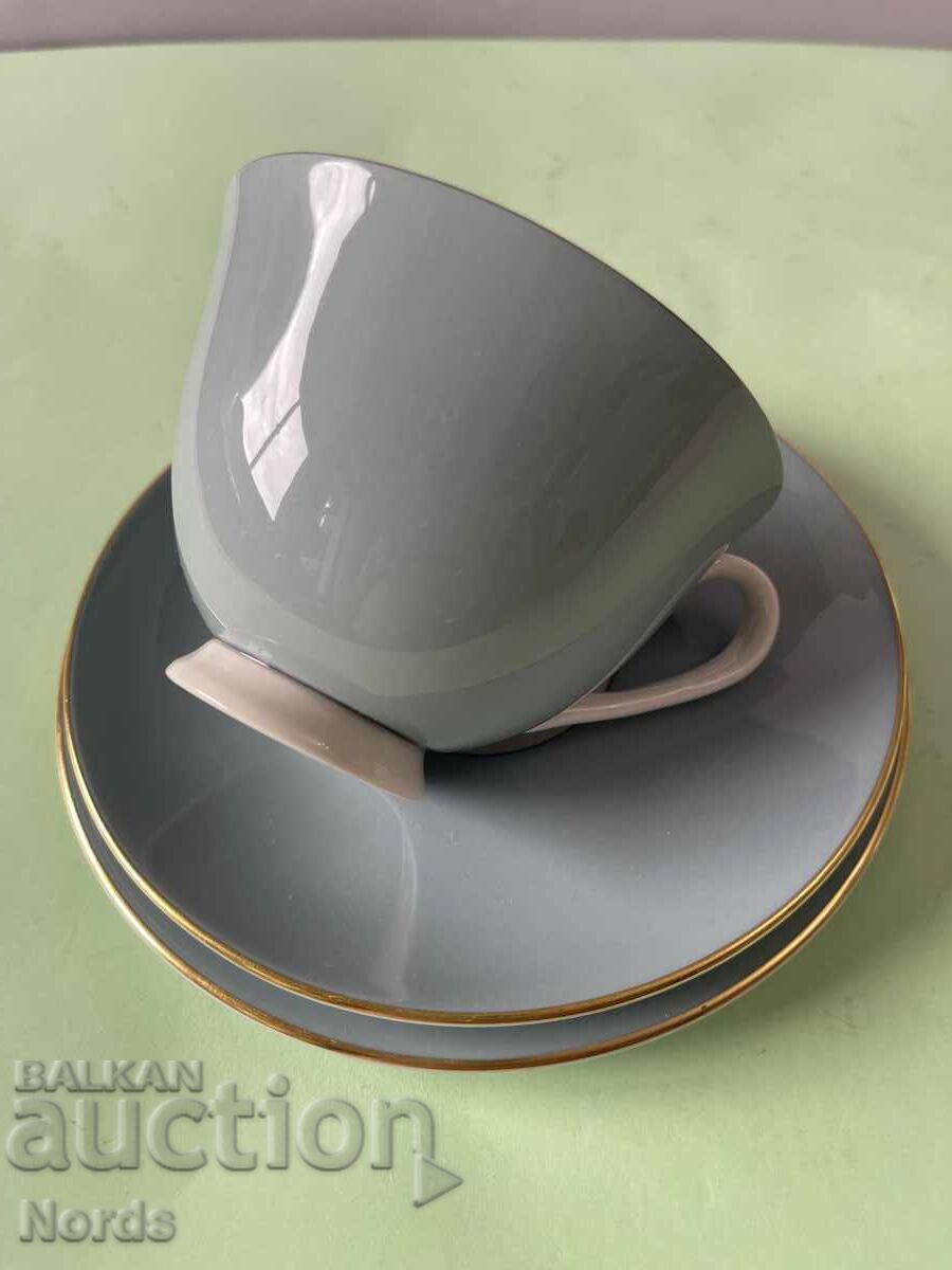 Auction  Royal Doulton three-piece tea set