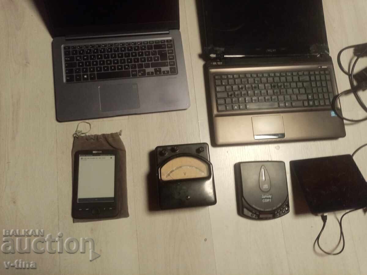 Licitație Patru laptopuri + ramă foto + CD disc + e-book reader + aparat de măsurat