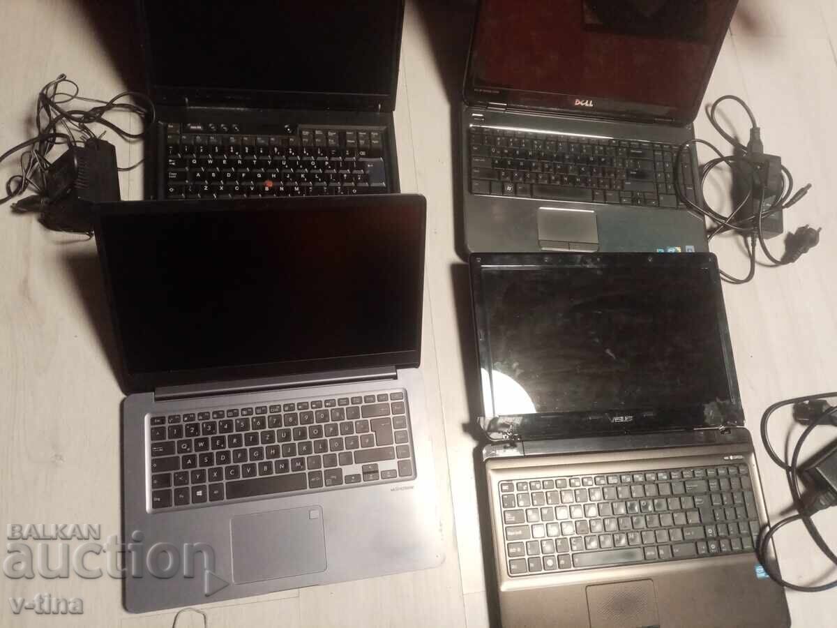Livrarea Patru laptopuri + ramă foto + CD disc + e-book reader + aparat de măsurat