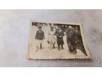 Photo Sofia Man two women and a boy walking along Tsar [Osvoboditel] Blvd