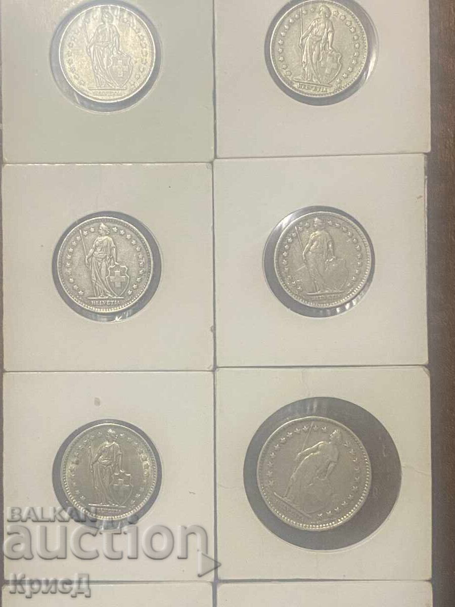 Delivery of Lot of 8 Swiss silver Helvetia francs