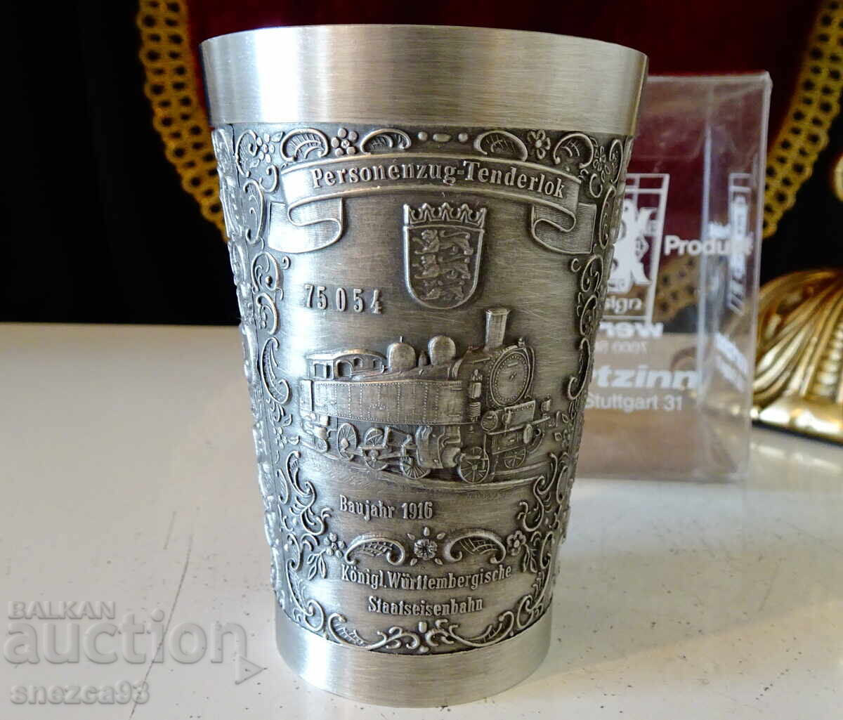 Delivery of Tin cup with train, locomotive, box