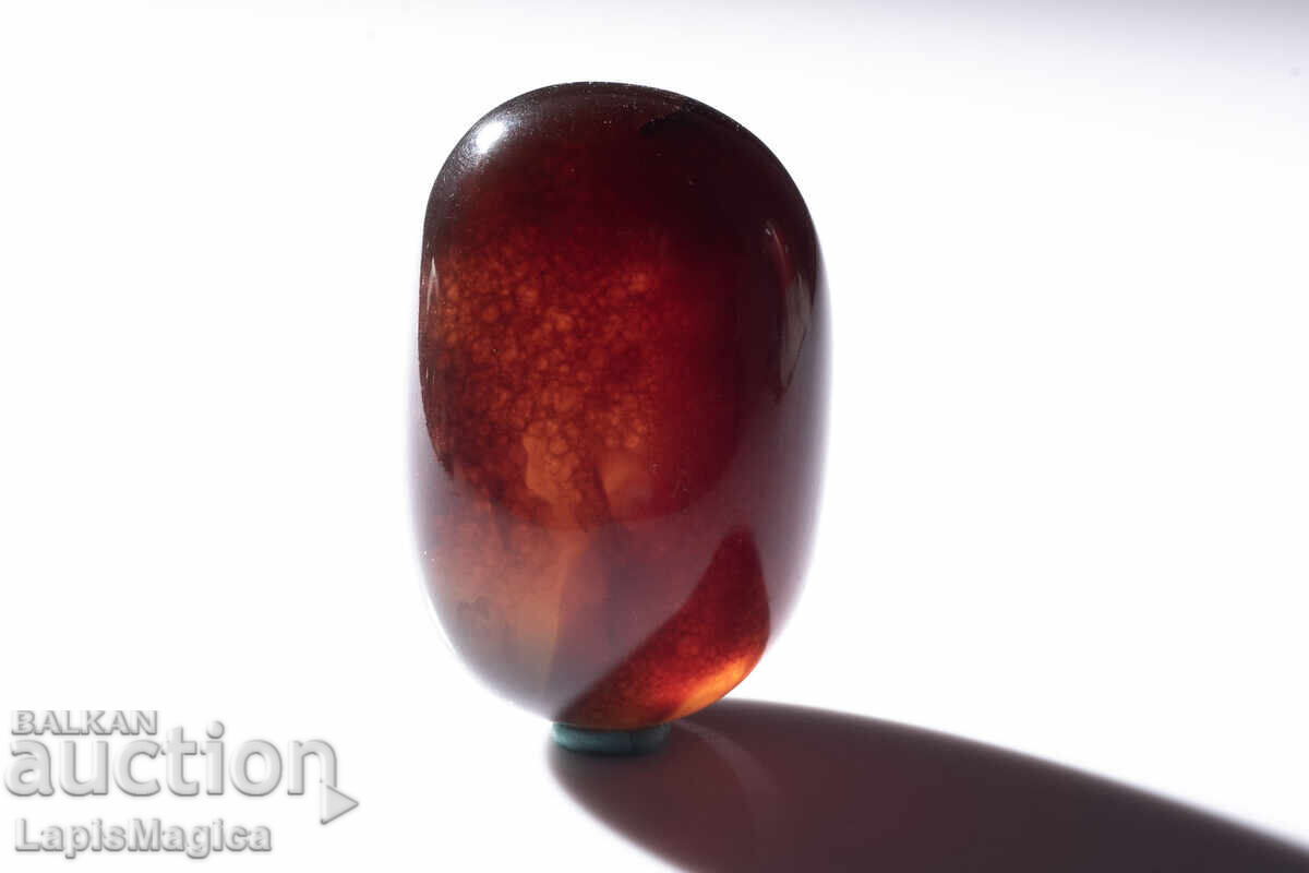 Син кехлибар от Индонезия 70.8ct полиран с цена € 5.50 | 10.76 лв.