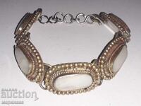ANTIQUE BRACELET. BRONZE, MOTHER OF PEARL