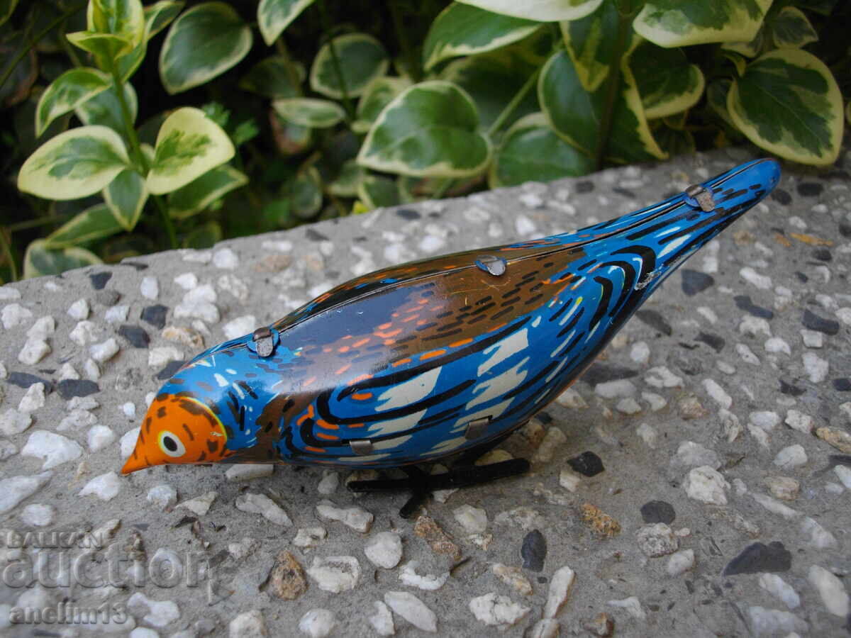 СТАРА МЕХАНИЧНА ЛАМАРИНЕНА ИГРАЧКА ПТИЧКА с цена € 20.00 | 39.12 лв.