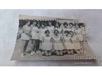 Photo Sofia Young girls in white dresses on the street