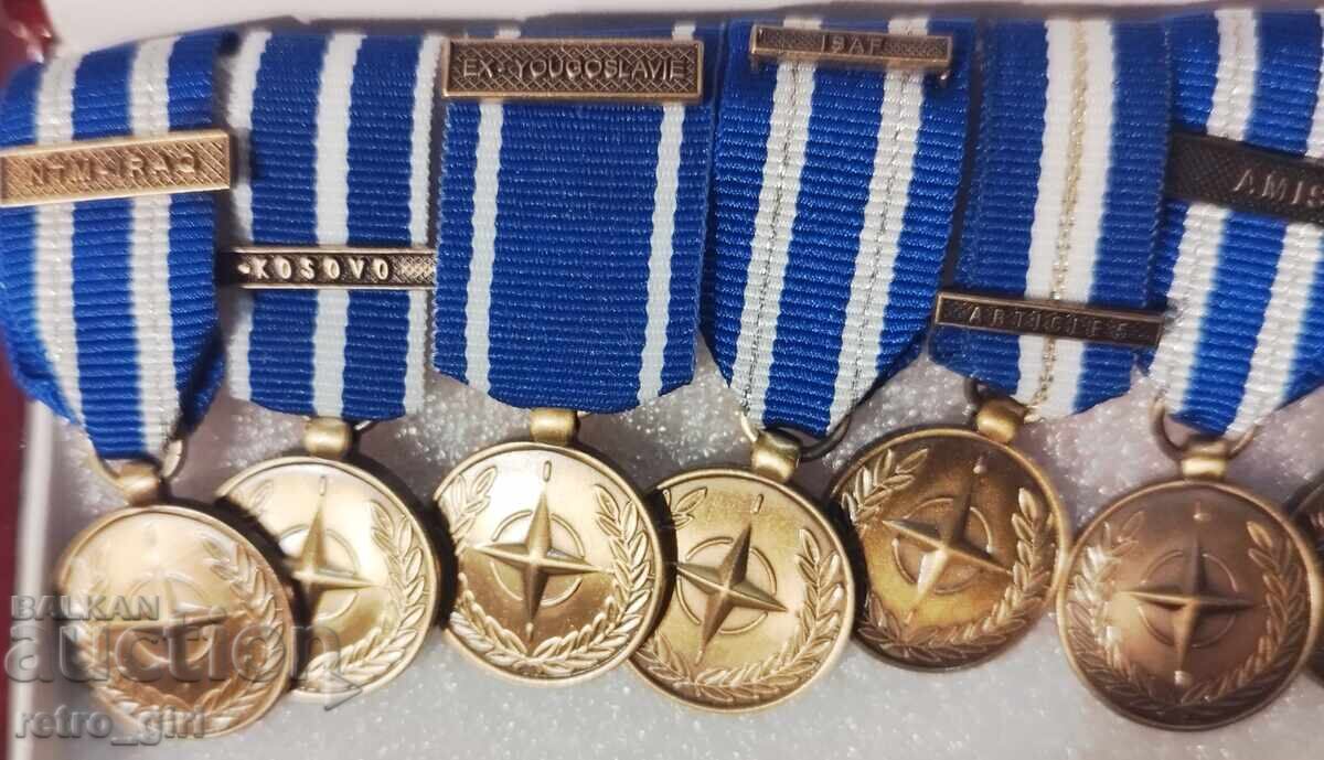 Δημοπρασία Συλλογή μεταλλίων (μινιατούρες) από διάφορες αποστολές του ΝΑΤΟ και του ΟΗΕ