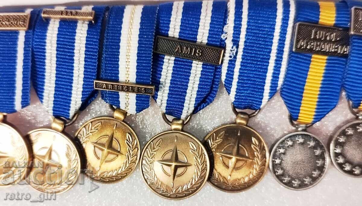 Παράδοση Συλλογή μεταλλίων (μινιατούρες) από διάφορες αποστολές του ΝΑΤΟ και του ΟΗΕ