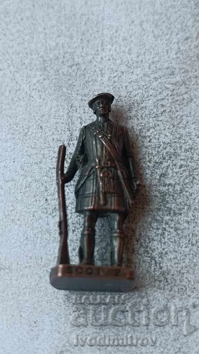 Figurină metalică din ou de ciocolată Scot 2 Figurină metalică din ou de ciocolată Scot 2