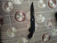 Μεταλλικό αναδιπλούμενο μαχαίρι σε σχήμα περίστροφου