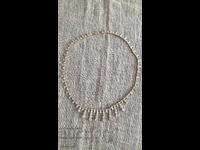 Antique elegant necklace with white stones