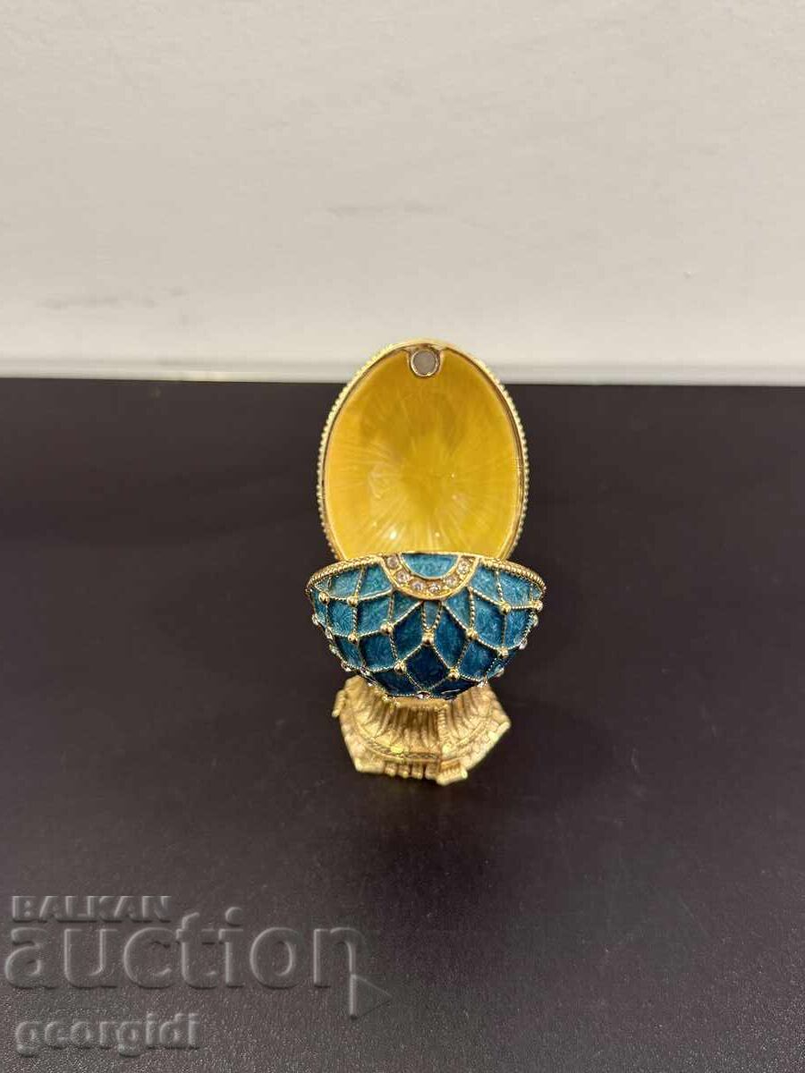 Livrarea Cutie de bijuterii emailată tip "Fabergé". Nr. 8132