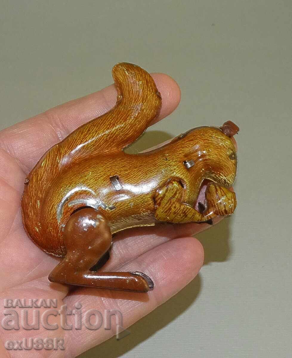 Παλιό μεταλλικό κουρδιστό παιχνίδι σκίουρος με τιμή € 15.00 | 29.34 BGN