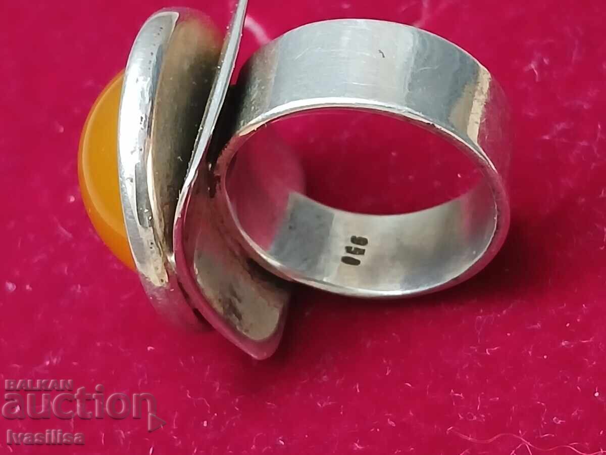 Auction  Massive silver ring with amber