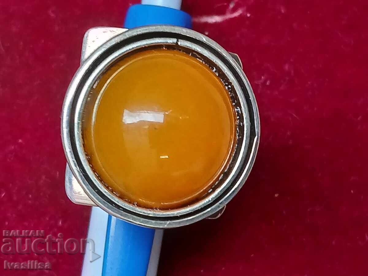 Delivery of Massive silver ring with amber