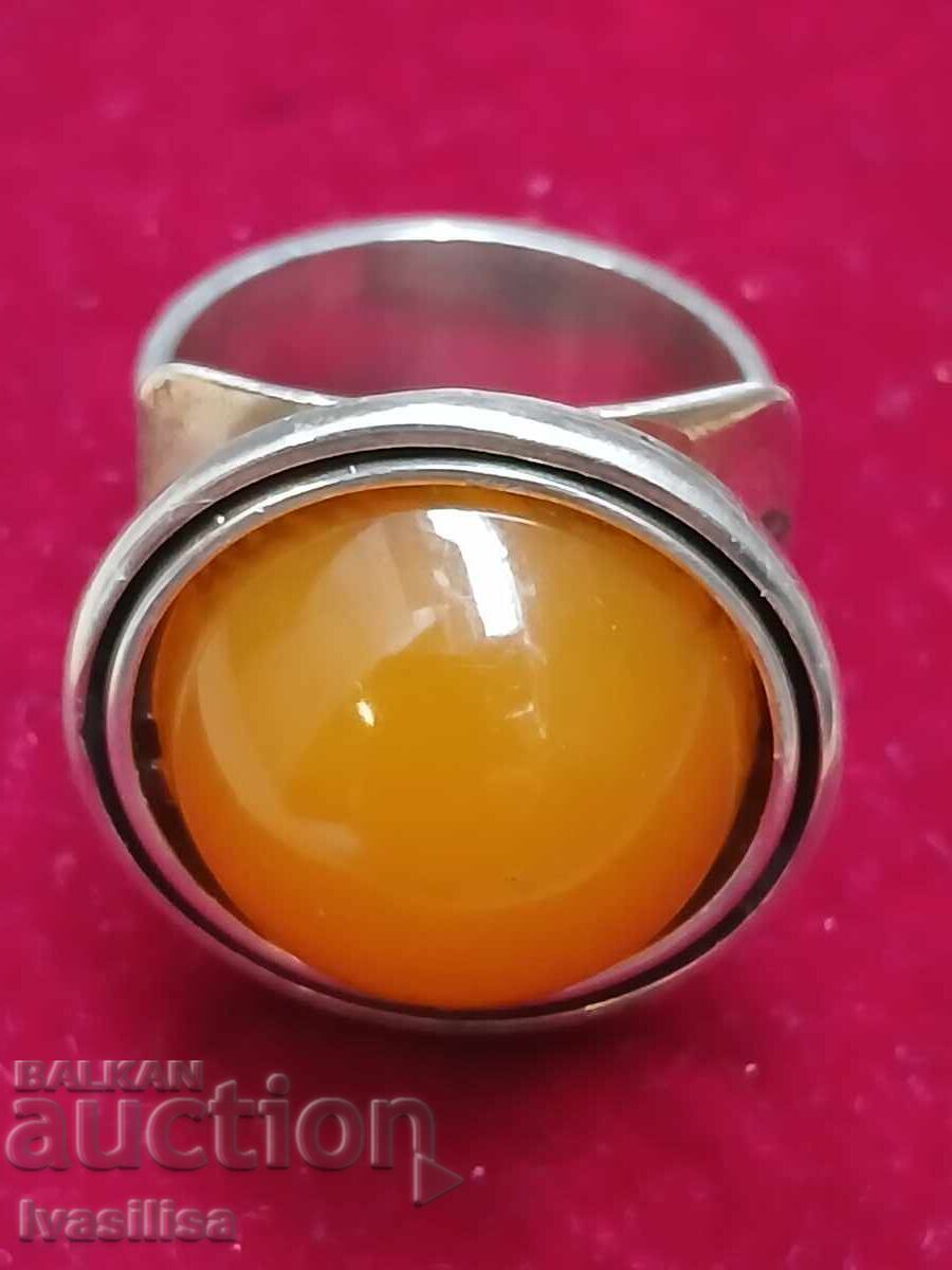 Massive silver ring with amber
