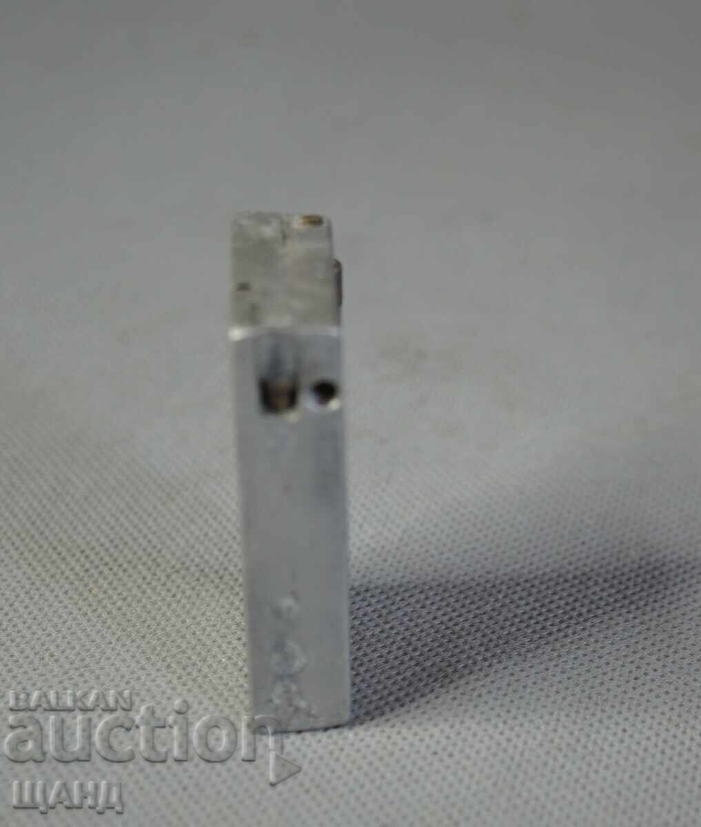 Auction  World War II old aluminum gasoline lighter