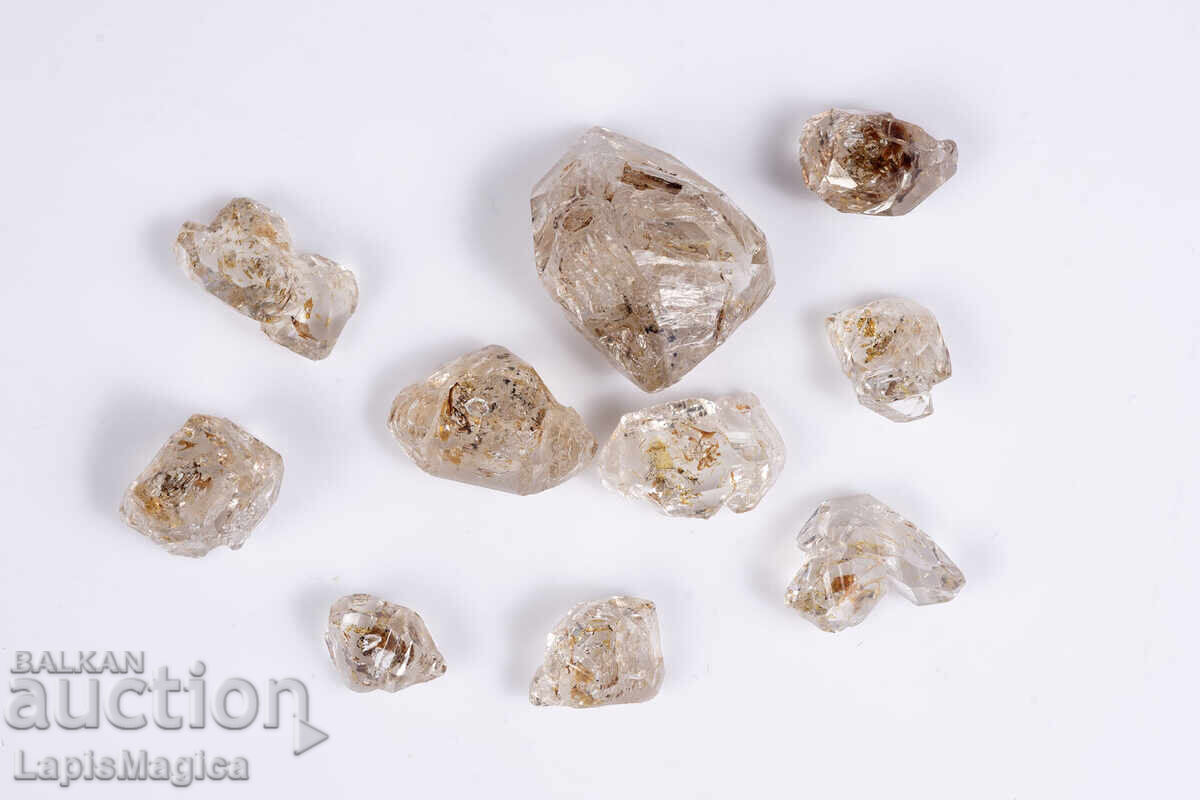 Παρτίδα 10 τεμ. κρύσταλλοι χαλαζία με εγκλείσματα πετρελαίου 29.2ct φθορίζοντες με τιμή € 9.00 | 17.60 BGN