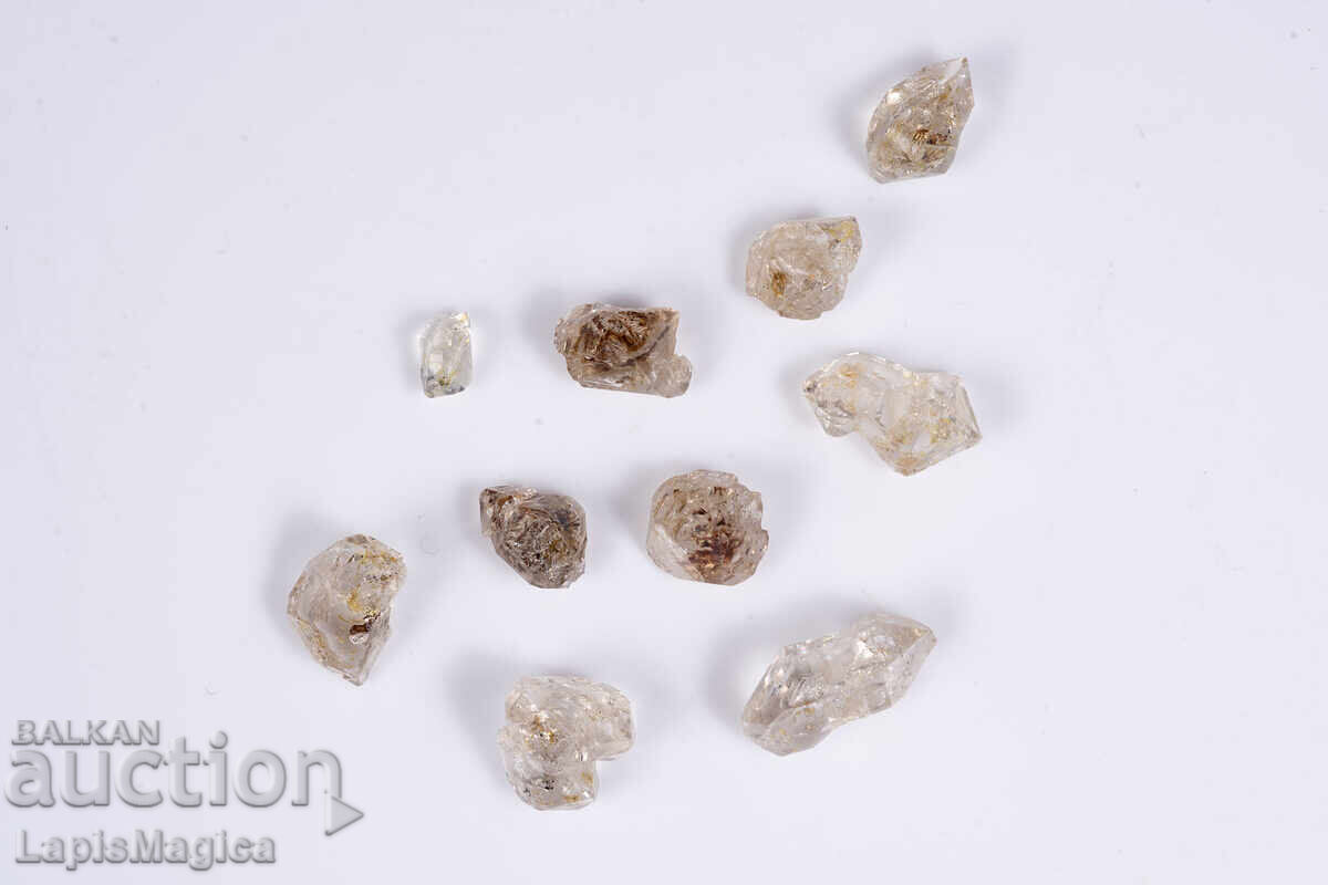 Παρτίδα 10 τεμ. κρύσταλλοι χαλαζία με εγκλείσματα πετρελαίου 24.1ct φθορίζοντες με τιμή € 8.00 | 15.65 BGN