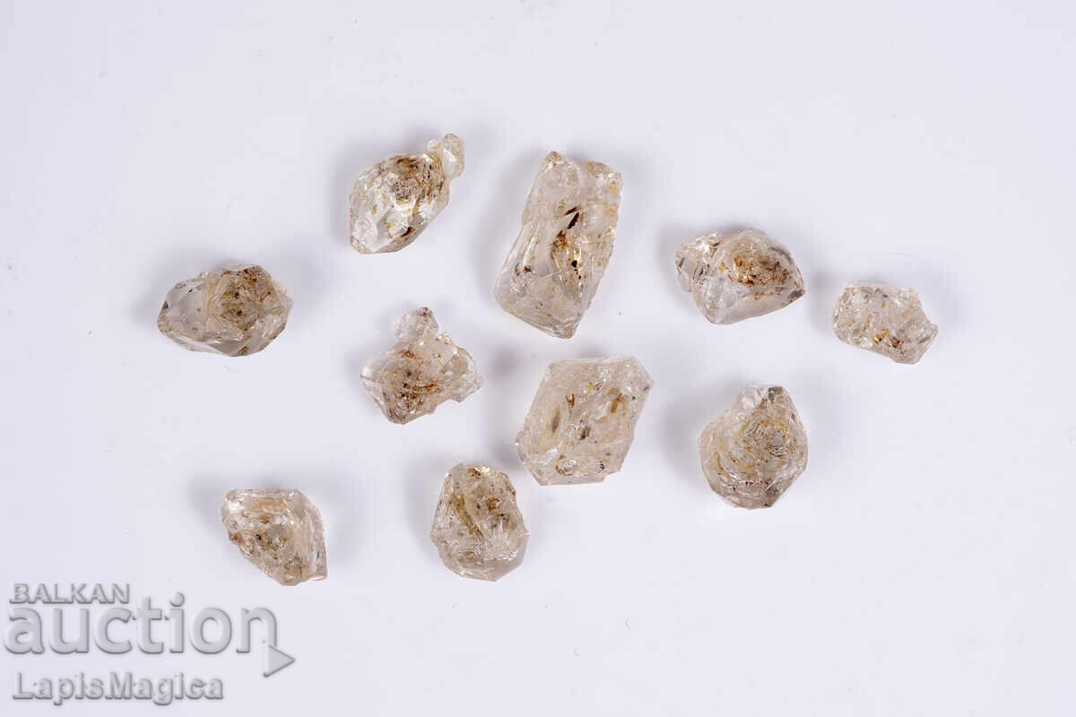 Παρτίδα 10 τεμ. κρύσταλλοι πετρελαϊκού χαλαζία 28.6ct φθορίζοντες με τιμή € 9.00 | 17.60 BGN