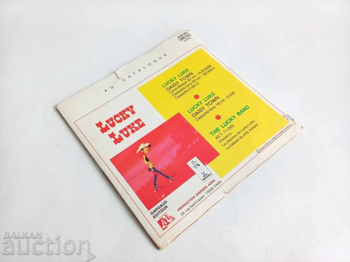 Lucky Luke Daisy town cu 45 T Le petit menestrel Morris 19 - 7 Lucky Luke Daisy town cu 45 T Le petit menestrel Morris 19 - 7
