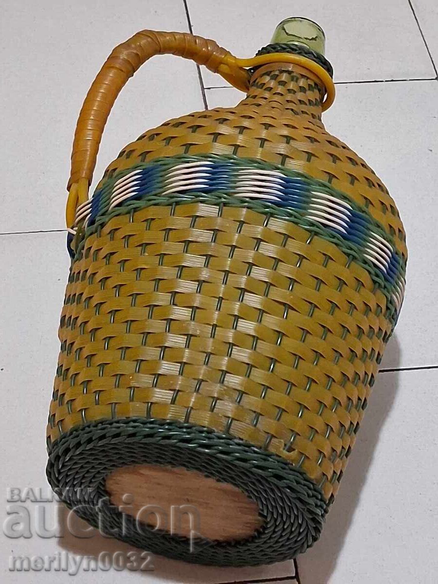 Delivery of Old woven demijohn, bottle with weave, bottle, glass