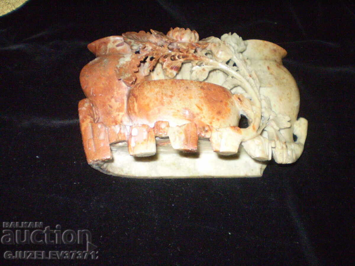 Hand-carved soapstone figurine vase floral motifs