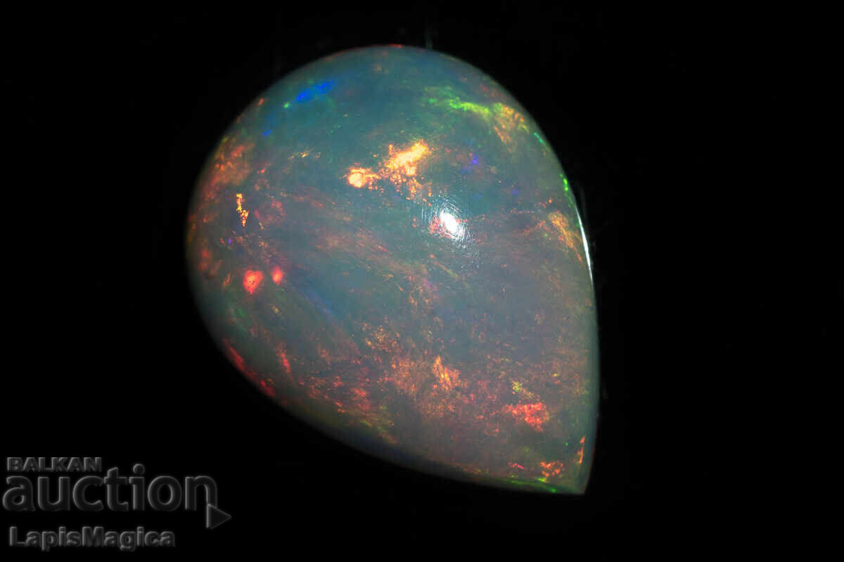 Livrarea Opal etiopian natural 2,86ct 13x9,8mm caboșon picătură