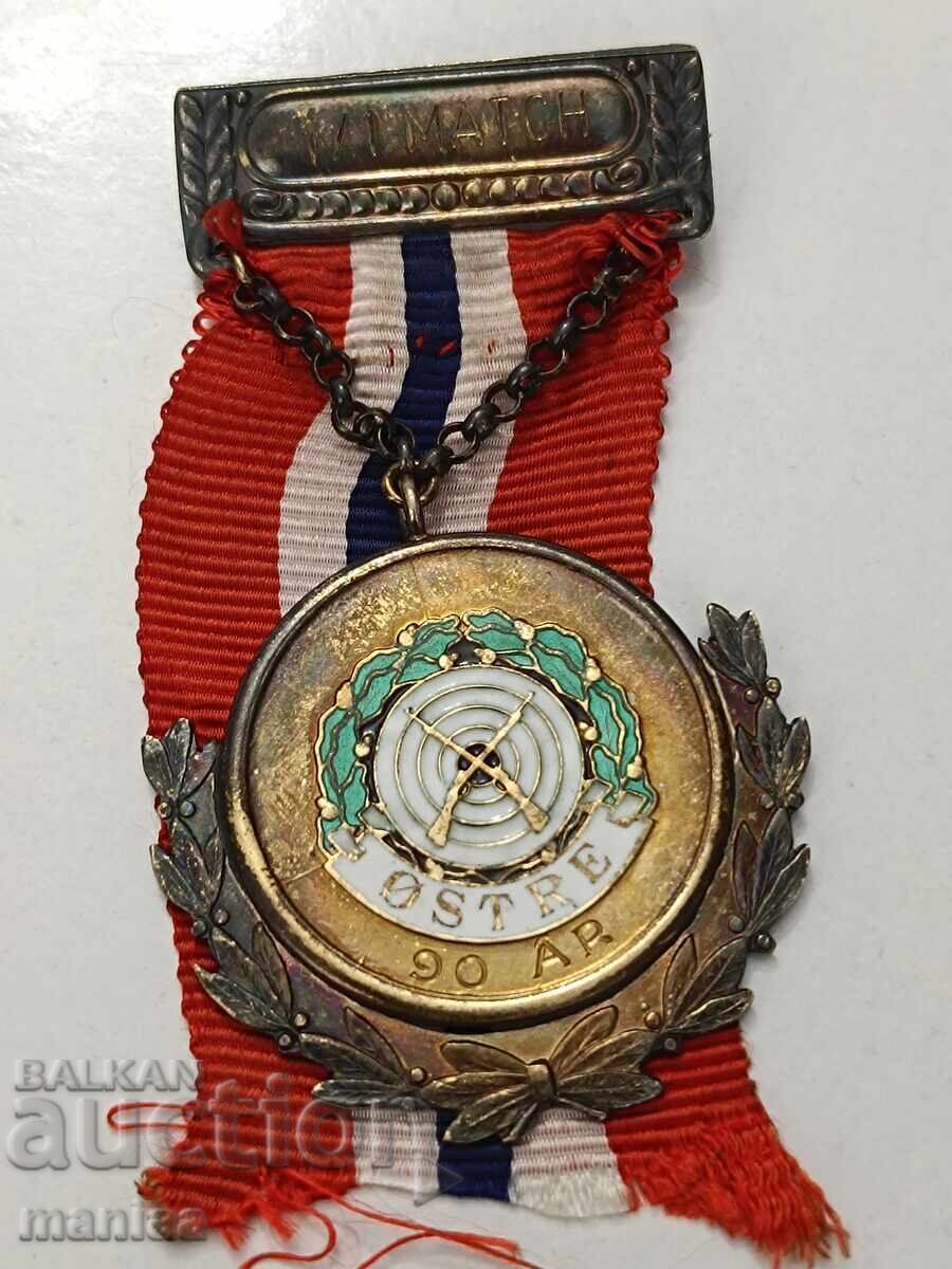 Παράδοση Ασημένιο μετάλλιο Νορβηγίας με σήμα
