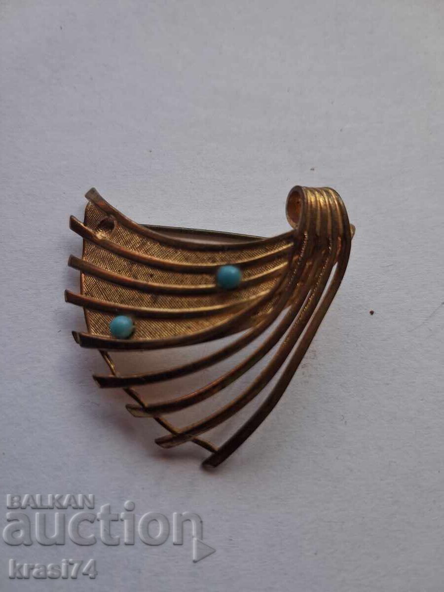 Gilded brooch