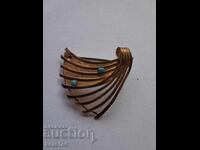 Gilded brooch