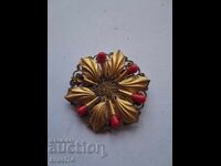 Gilded brooch