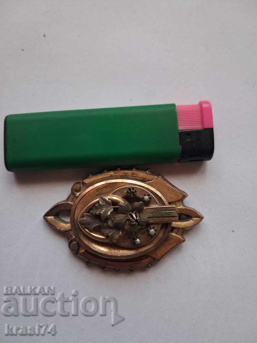 Gilded brooch